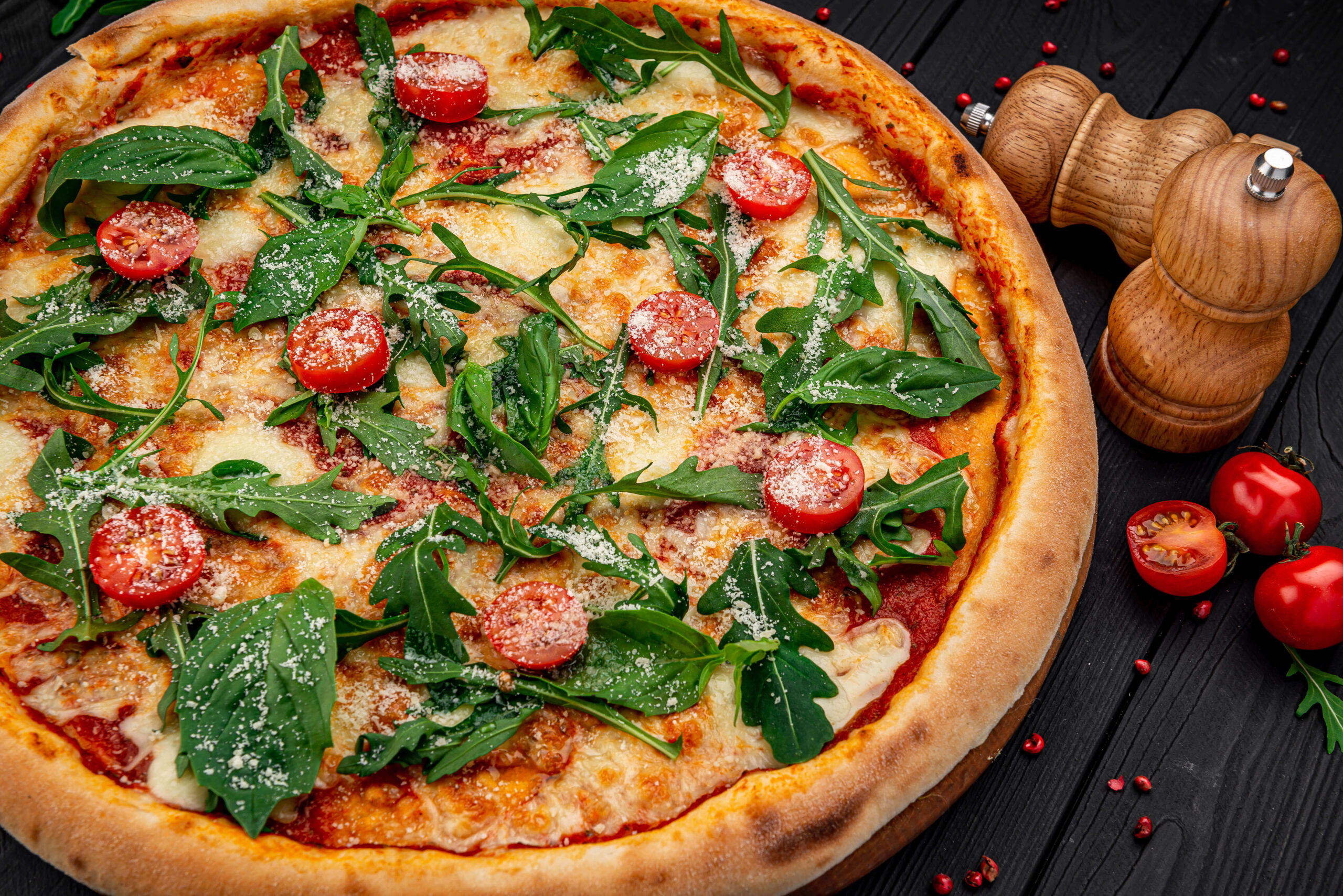 tasty-hot-italian-pizza-black-wooden-table